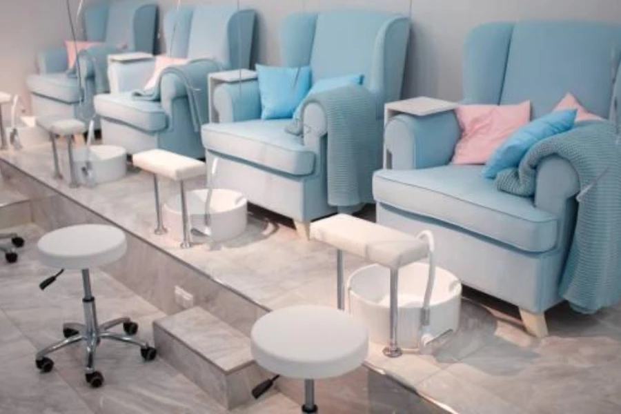 A row of affordable pedicure chairs