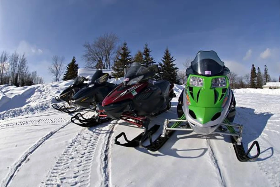 A set of entry-level (trail) snowmobiles