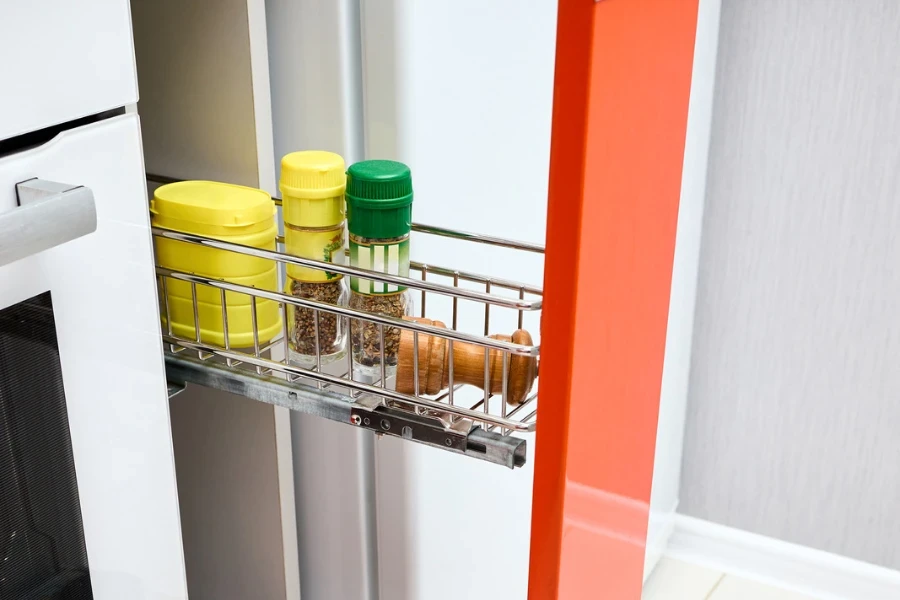 A slide-out spice rack in a kitchen