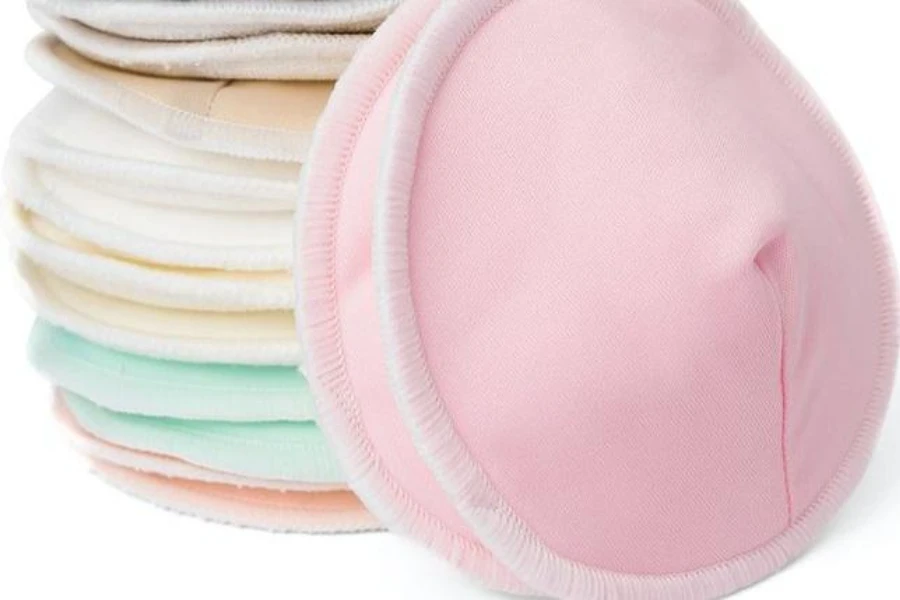 A small stack of nursing pads with a contoured design