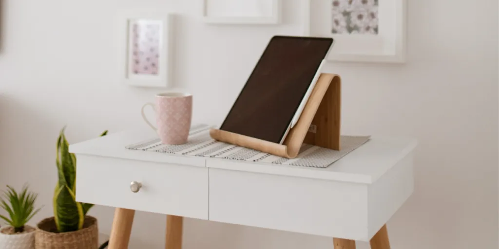 A tablet on a wooden tablet PC stand