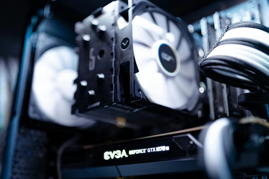 A thick black cooling fan installed in a custom PC