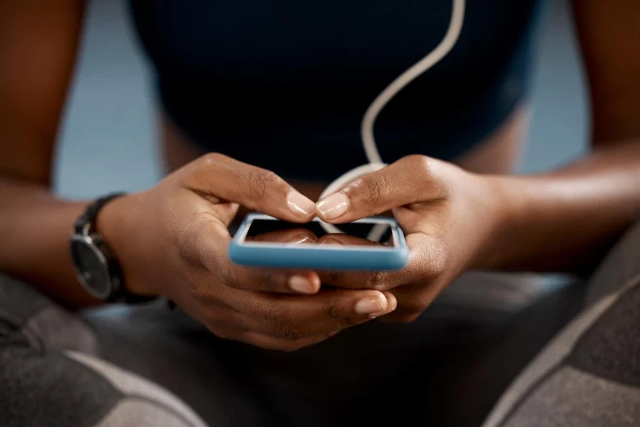 a woman using a MP3 player