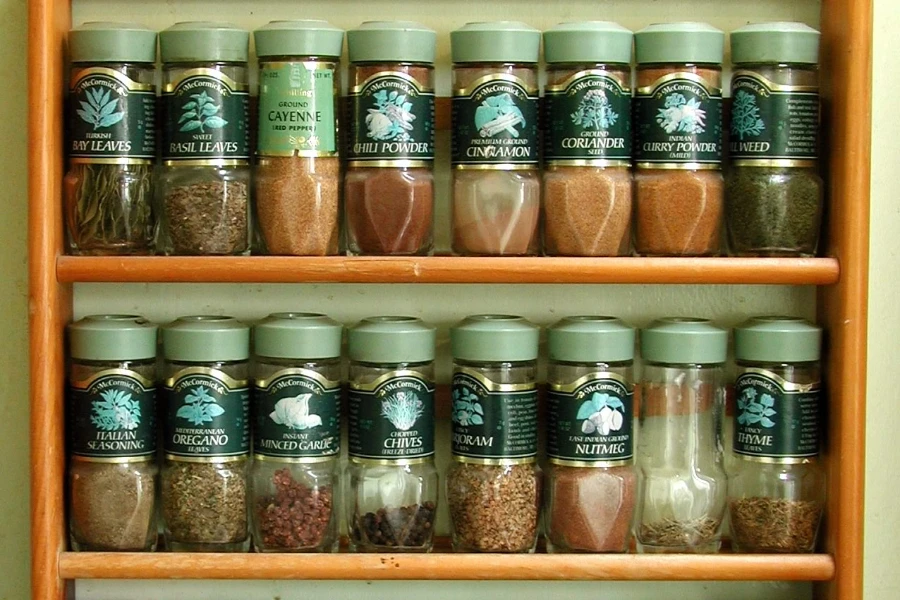 A wooden rack full of herbs and spices