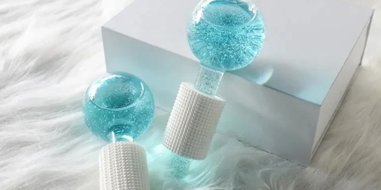 An ice globe pair with white rubber grips