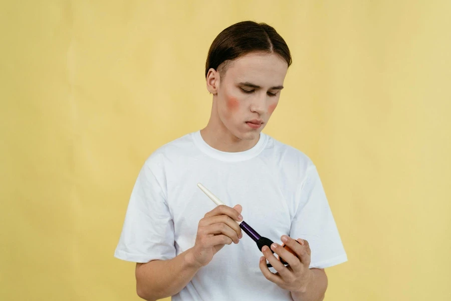 an influencer applying the blush