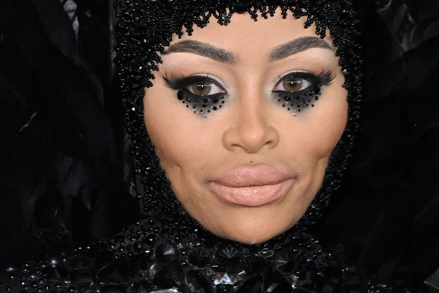 Black Chyna with a goth glam look featuring black eyeshadow and gemstones