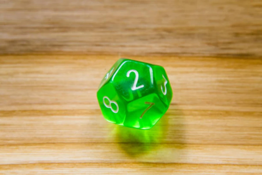 Bright green D10 die with white lettering on a table