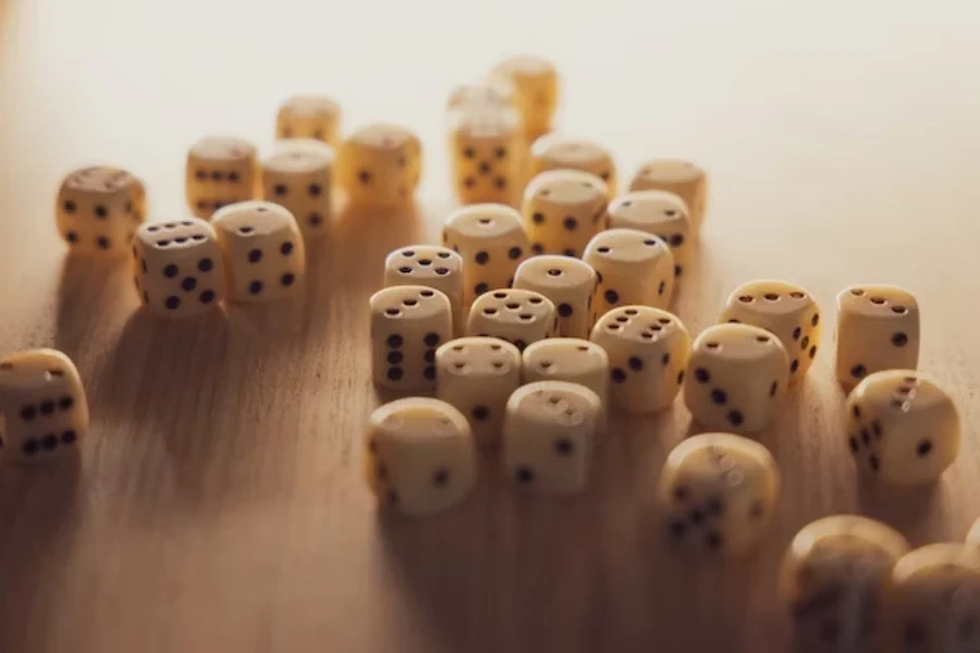 Collection of traditional six-sided dice on a table