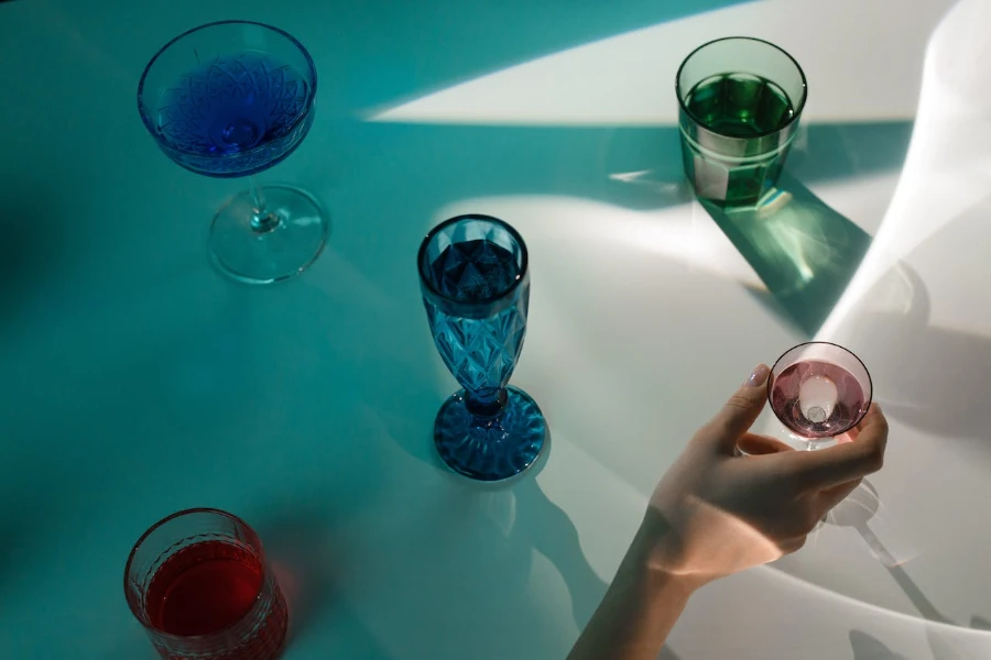 colored wine glasses placed on a table