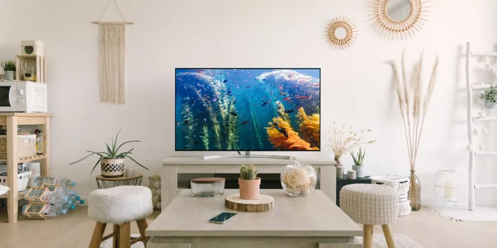 Colorful TV screen in a beige living room