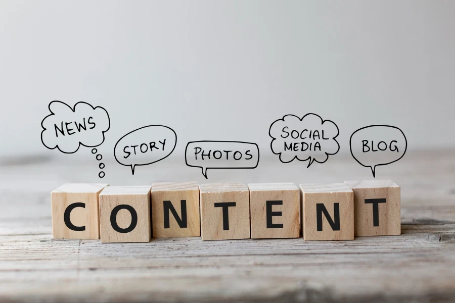 Content written on wooden cubes with speech bubbles above