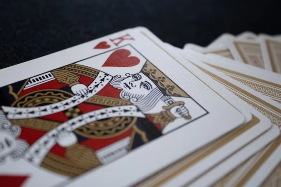 Deck of plastic playing cards with king on top