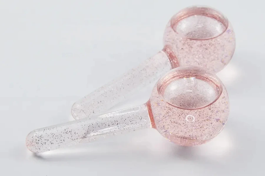 Double ice globe massagers on a white background
