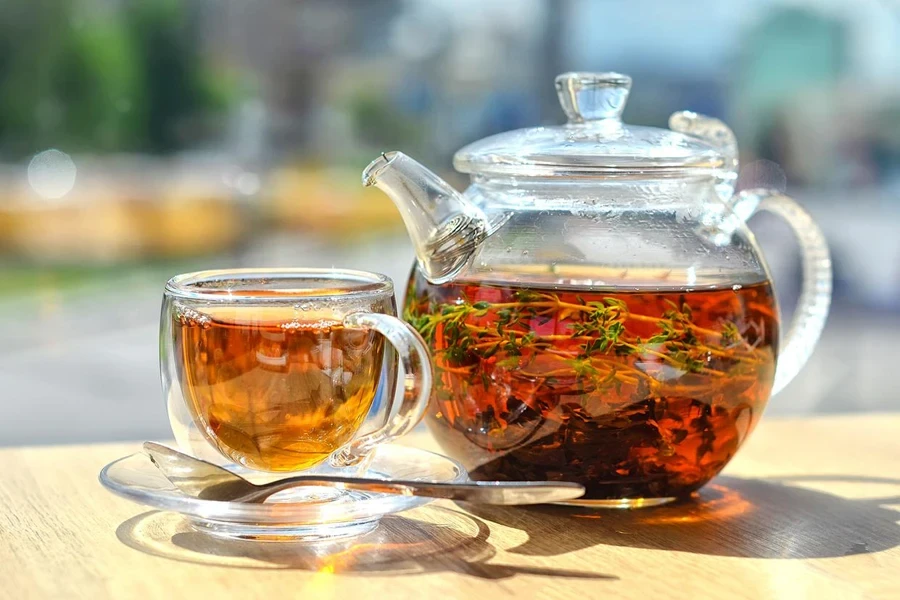 glass tea cup and saucer