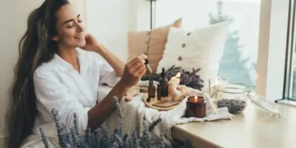 Image of a woman applying essential oil-infused cosmetics
