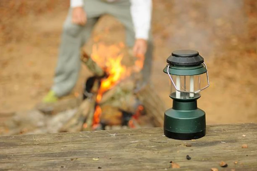 Solar camping light on wooden table during the day time