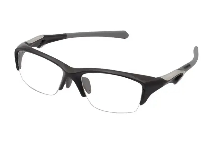 Gafas de squash graduadas con lentes transparentes resistentes y patillas grises.