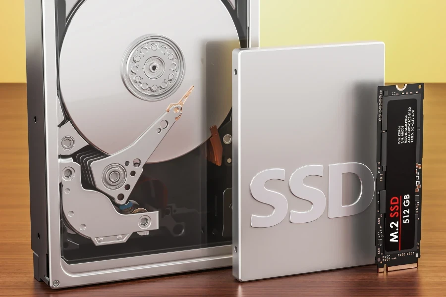 Three different types of hard drives on a wooden table