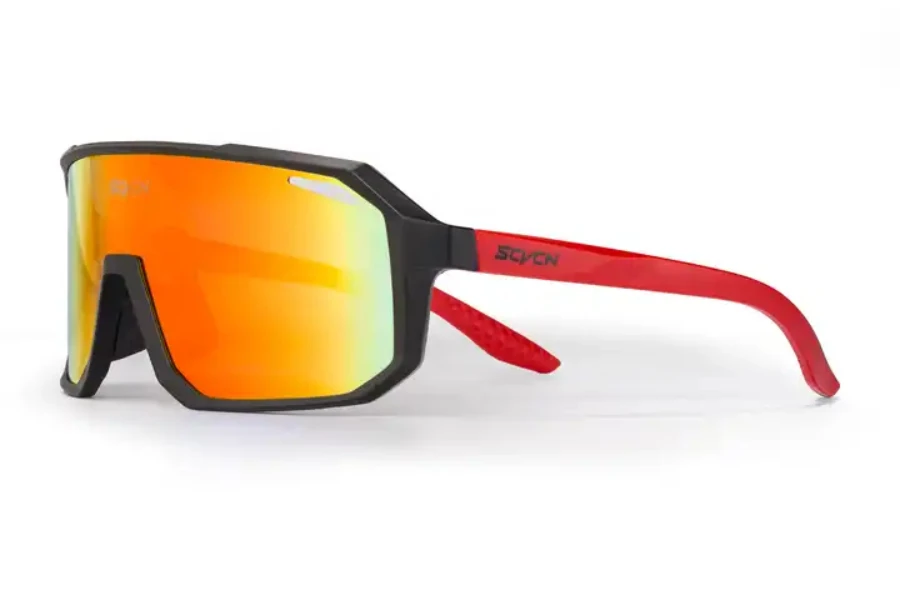 Tinted squash goggles with colorful lens and red arm frame