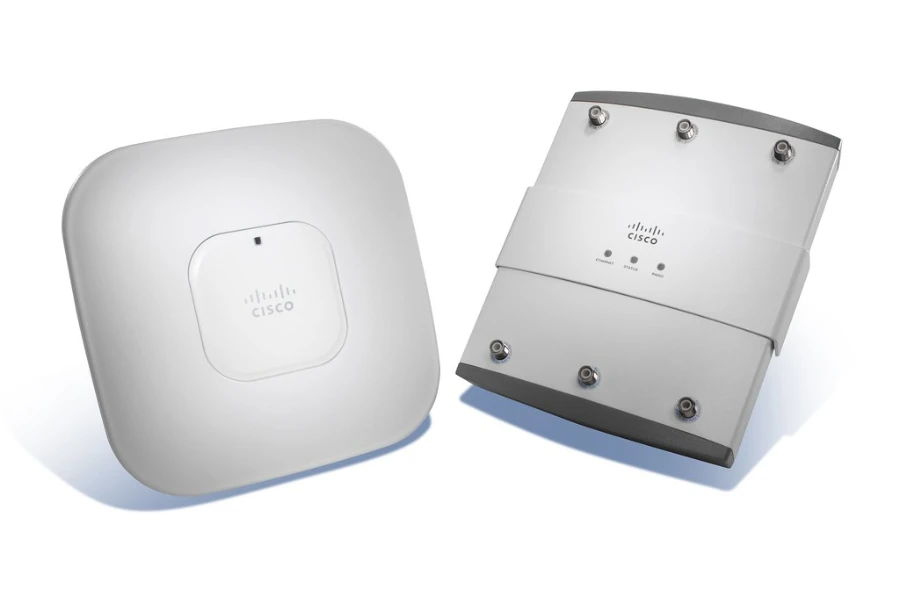 Two wireless access points on a white background