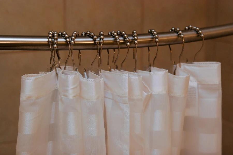 White shower curtains with hooks