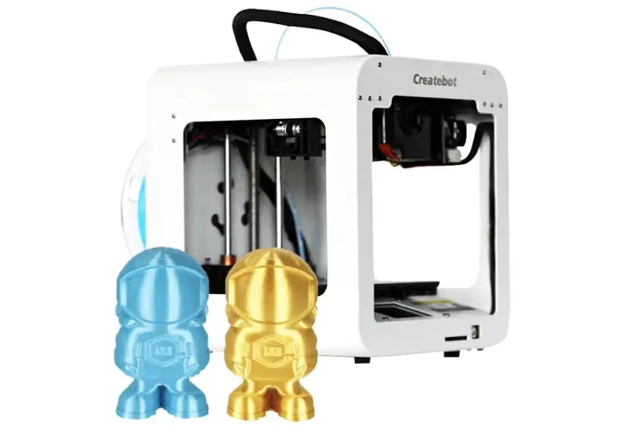 Impressora 3D com brinquedos azuis e marrons