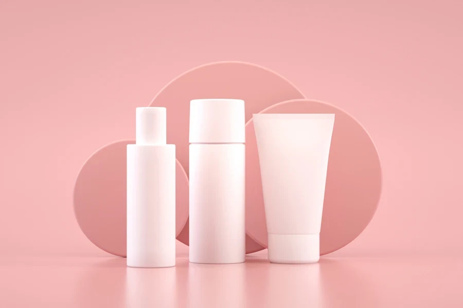 Cream and Lotion on pink background