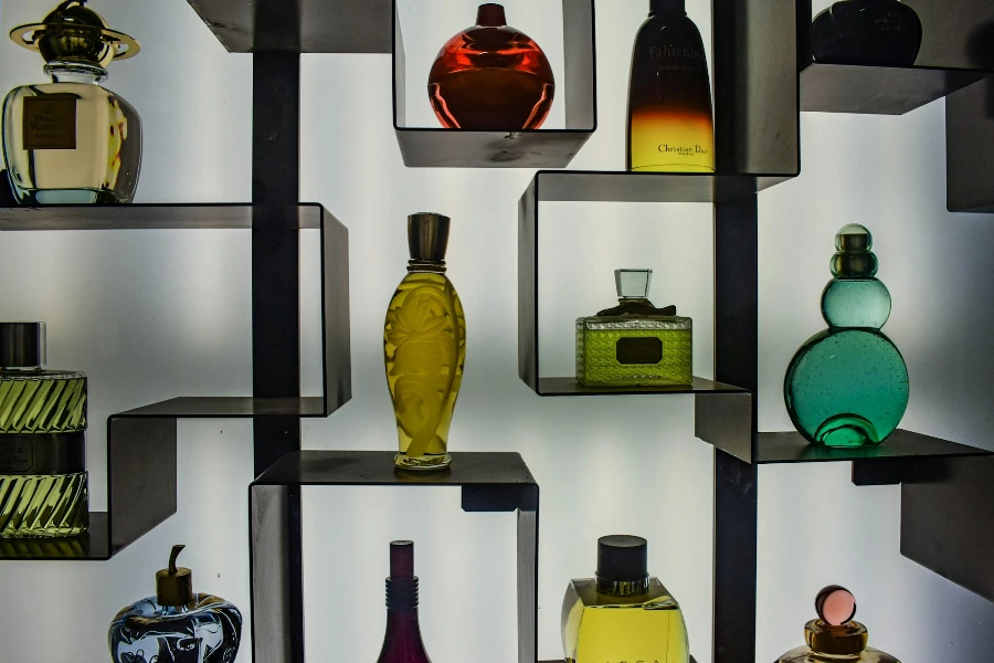 A collection of  perfume bottle on a shelf