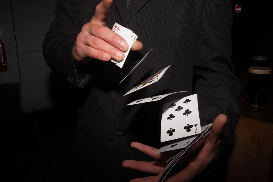 A Man Playing Cards ?x Oss Process=style Full