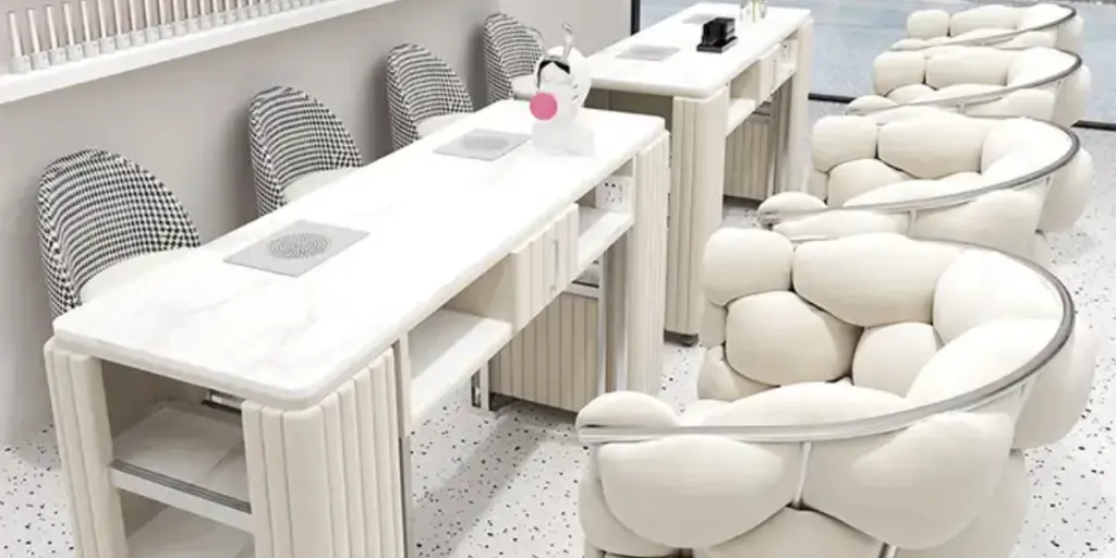 A manicure table and chair set in a bright salon
