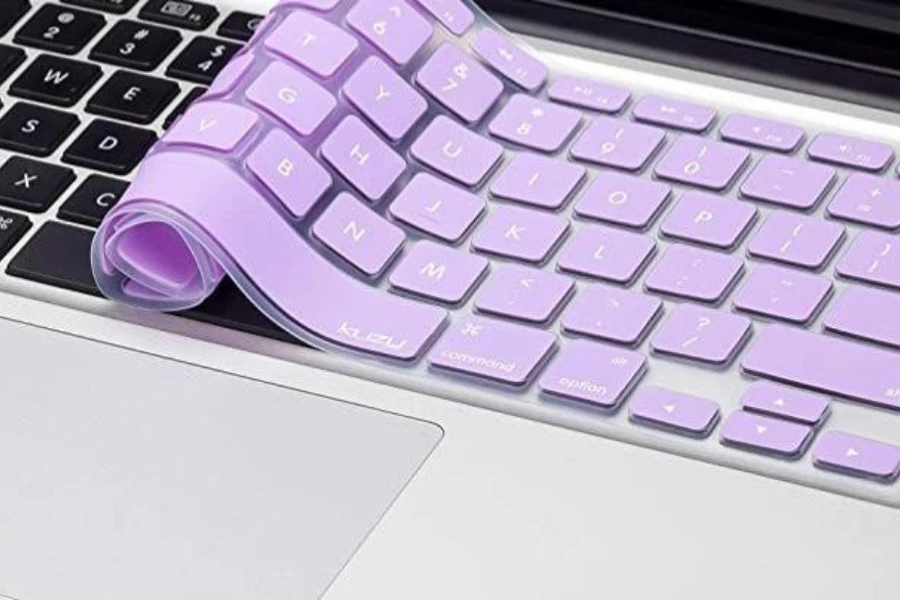 An easy-to-use keyboard cover semi-rolled on a laptop