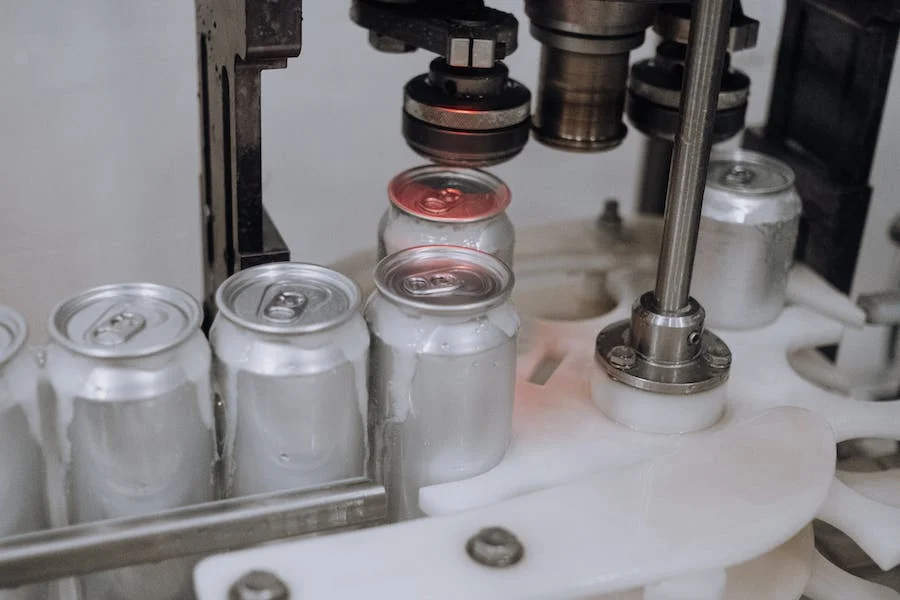 Beers cans in the production line at a factory
