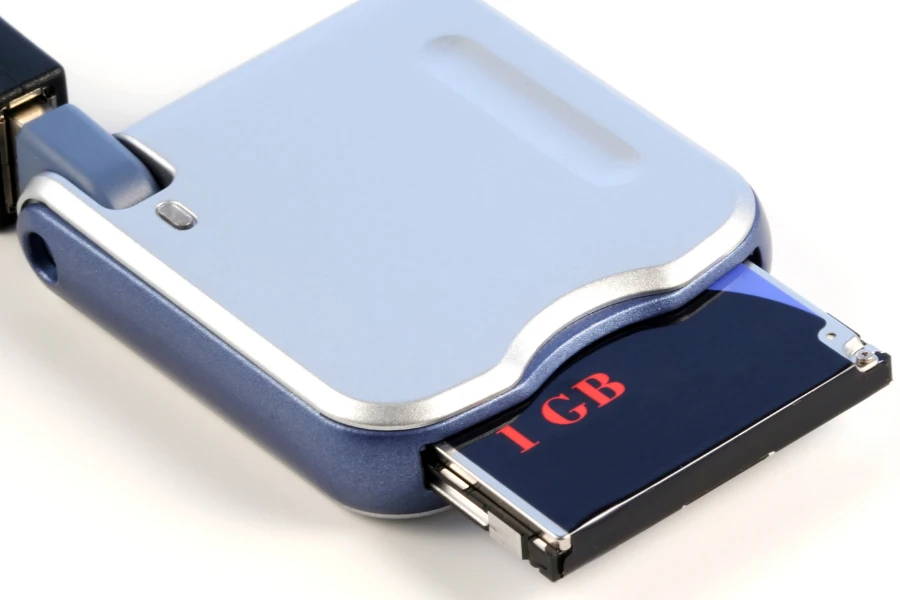 Blue card inserted into shiny blue aluminum card reader