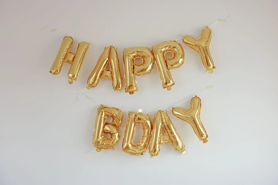 Closeup birthday party balloons on white background
