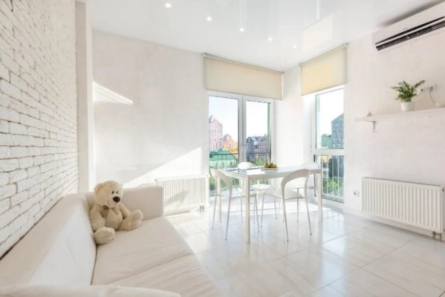 Contemporary apartment room with roller shades