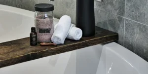 Dark stained wood bathtub tray