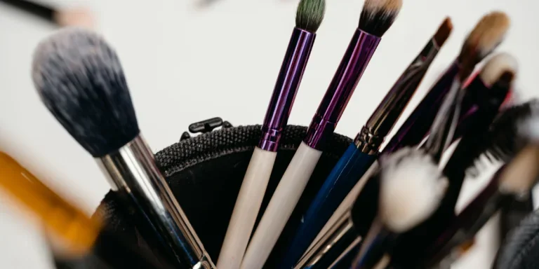 Different makeup products in a container