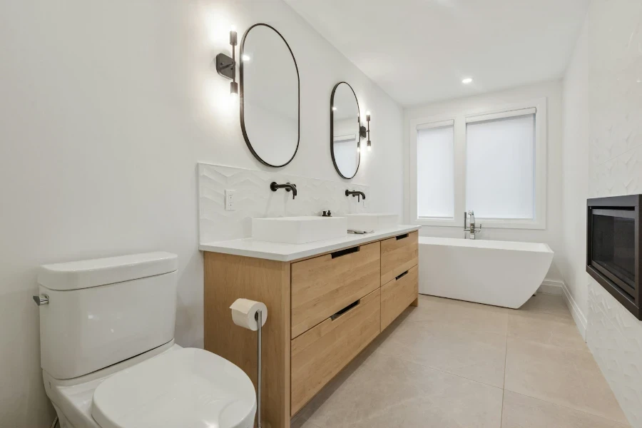 Double sink vanity with black bathroom wall light fixtures