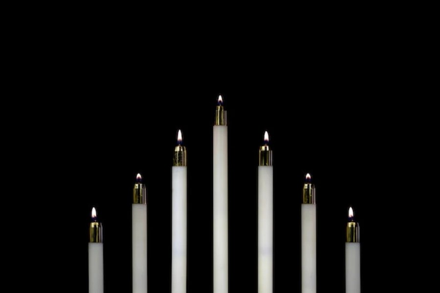 Flameless taper candles on a table