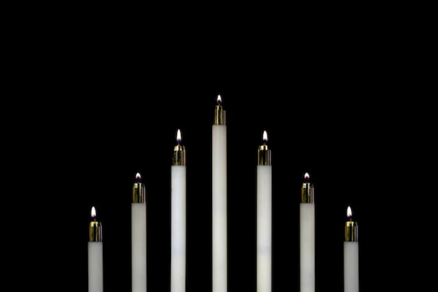 Flameless taper candles on a table