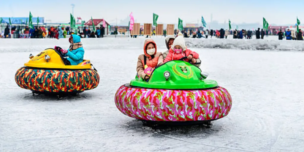 Large inflatable ice bumper cars on outdoor ice rink
