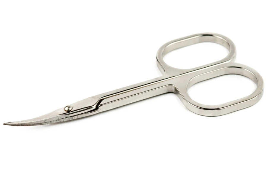 Manicure scissors placed on a white background