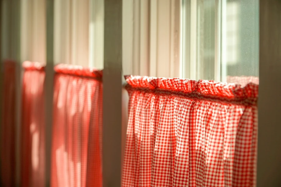 Red gingham patterned half curtains
