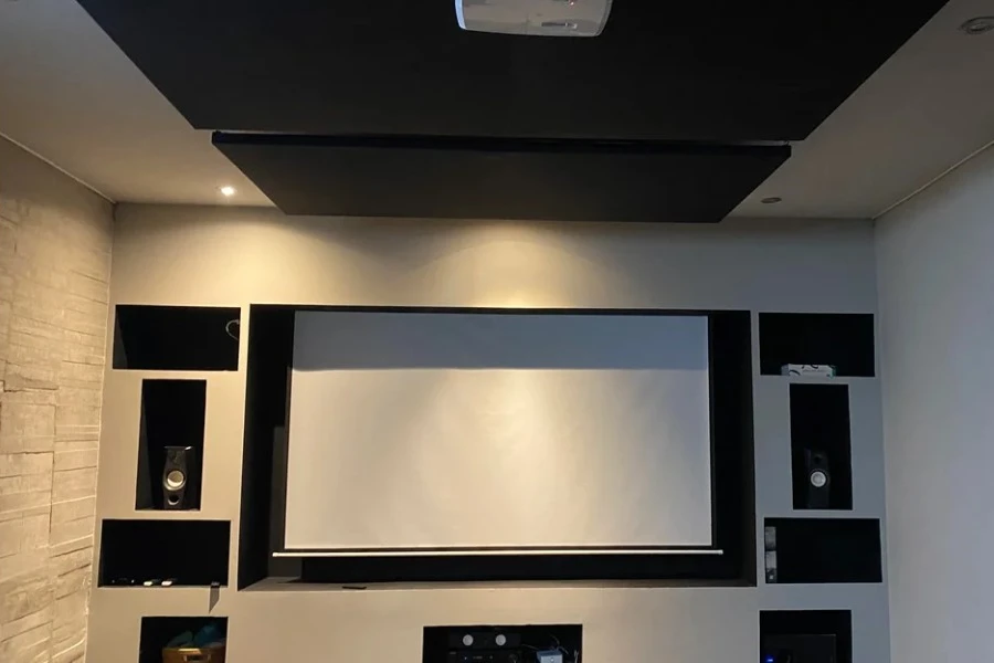 walls and ceiling of a small home theater covered in acoustic panels