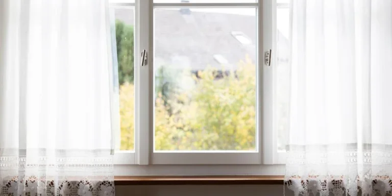 White sheer curtains with lace trim