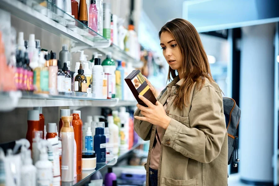 A woman choosing sunscreen