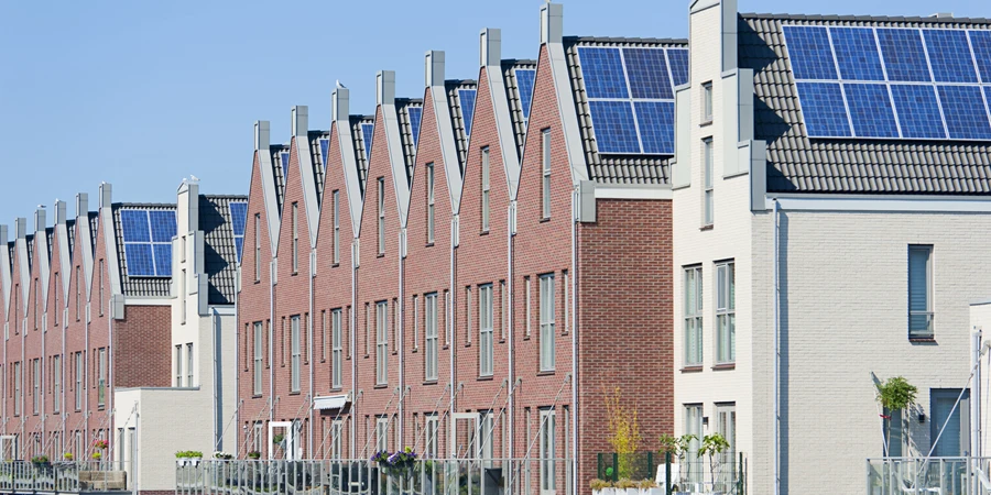 Modern Dutch houses with solar panels on roof
