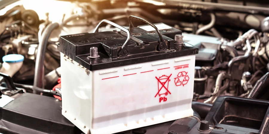 The car battery of the automobile electrical system in the engine compartment