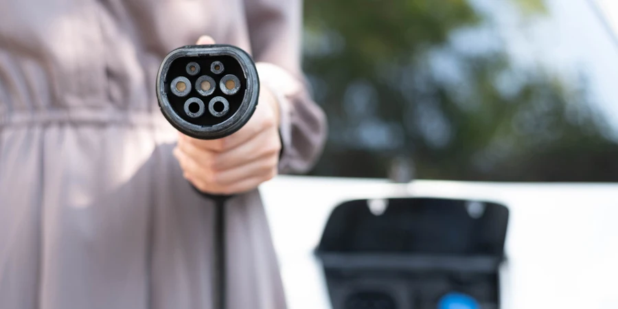 Type 2 EV charger with blurry background
